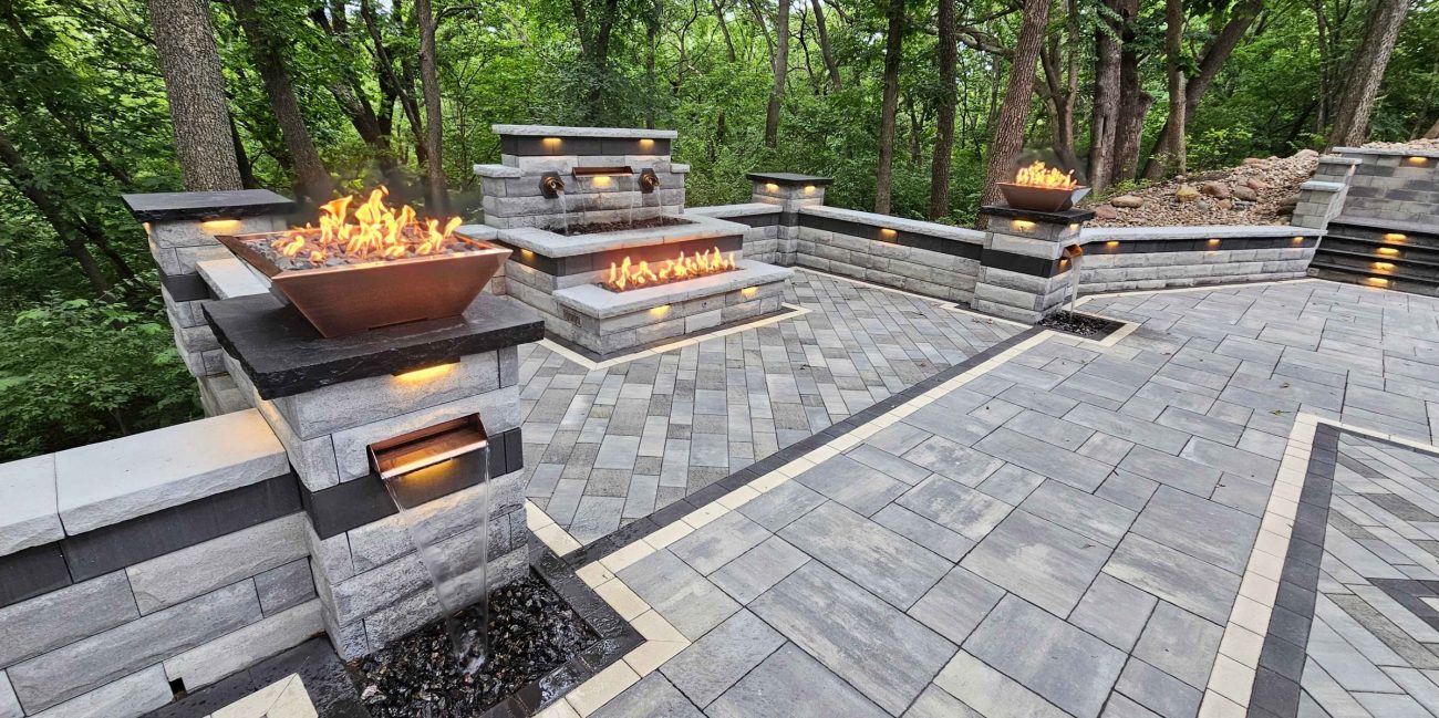 Unilock outdoor patio with fire features